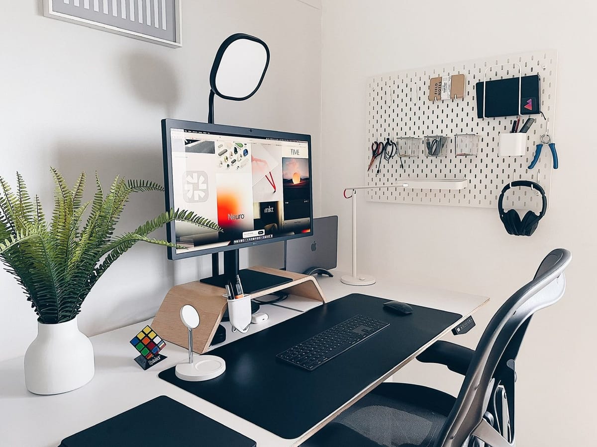 Creative workspace with modern desk setup and natural lighting